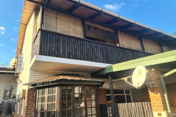 Immerse yourself in the serene Sabie lifestyle with this well positioned townhouse that blends practical family living with a touch of ...