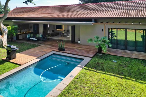 Experience luxury coastal living in this beautifully appointed fully furnished home ...