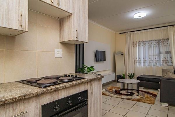 Very neat and spacious 2-bedroom 1st floor apartment ideally located near Brentwood Park ...