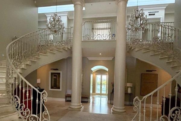 Nestled within one of the city’s most exclusive gated communities, this extraordinary ...
