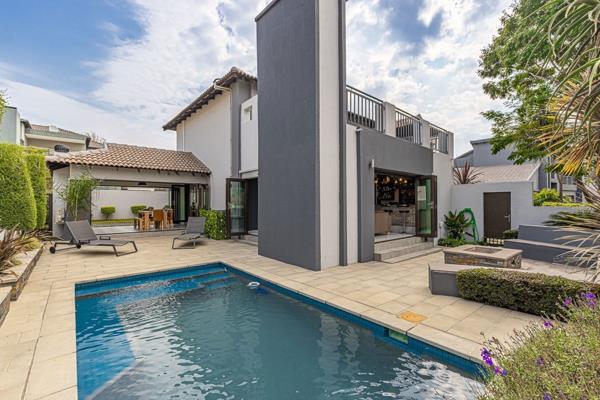 Beautiful Bali-inspired, double story home is tucked away at the end of a quiet ...