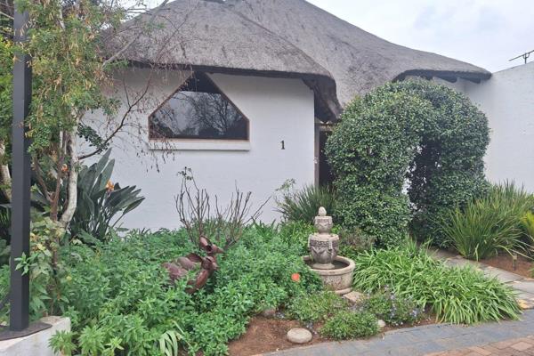 Step outside and discover an entertainer’s dream! The property boasts a stunning ...