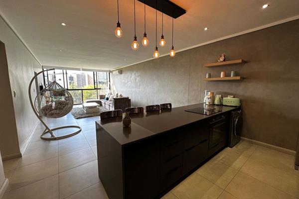 Experience refined apartment living in this elegant, fully furnished residence situated within the prestigious Ascend to Midstream ...