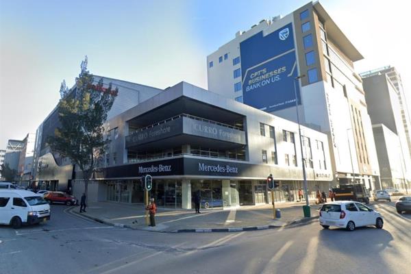This adaptable ground-floor commercial property at Amber Place, Cape Town, offers a ...