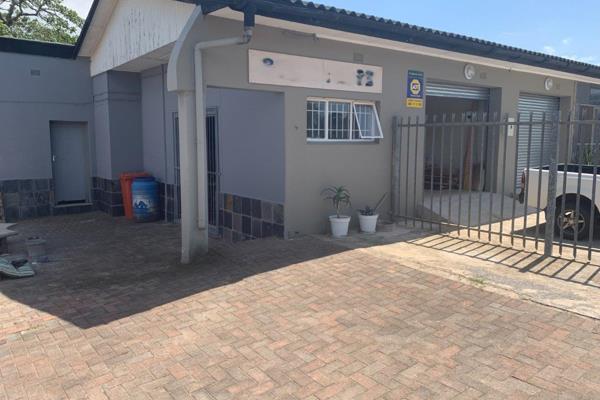 Elevate your business with this exceptional =- 50sqm light industrial unit ...