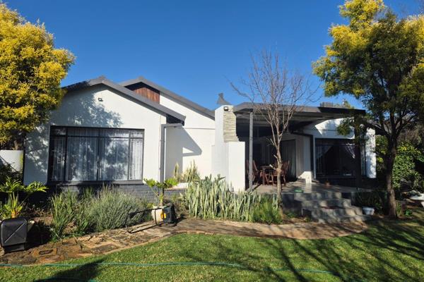 This neat and well-maintained family home offers generous living spaces, modern conveniences, and everything you need for comfortable family living.

The home features four spacious and sunny bedrooms and three modern ...