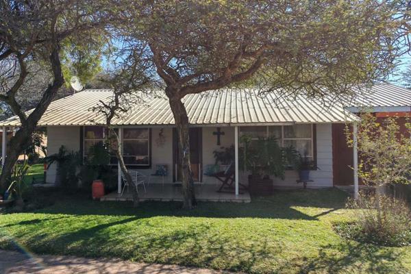 Discover the perfect blend of comfort, convenience, and relaxed bushveld living with ...