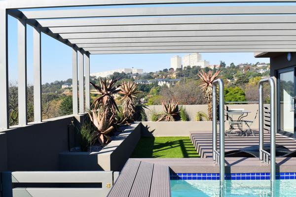 Nestled in the prestigious suburb of Westcliff, Johannesburg, this exceptionally modern apartment offers a seamless blend of luxury ...