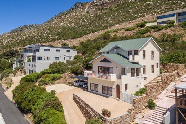Spacious Mountainside Family Home with Spectacular Sea &amp; Mountain Views – Fish Hoek

Nestled on the sought-after mountainside of Fish Hoek - this beautifully designed ...