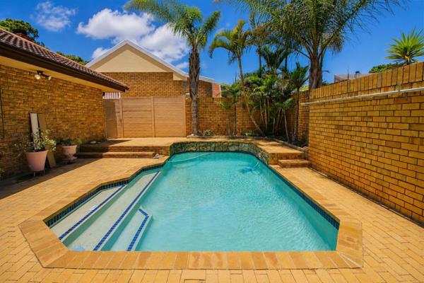 This beautiful, spacious, and meticulously maintained home offers lovely nature reserve views. 

Fully tiled throughout, the home ...