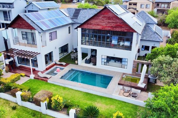This stunning 4-bedroom home located in the prestigious Waterfall Country Estate offers ...