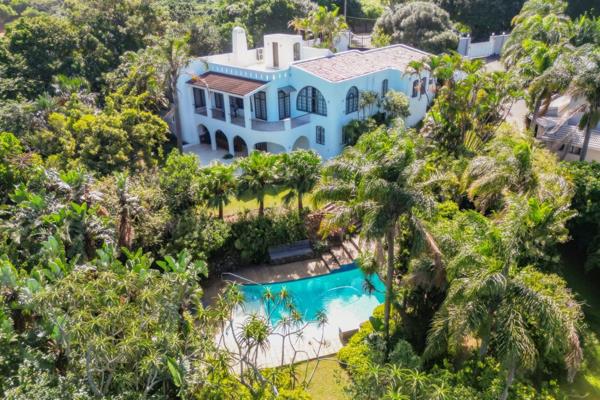 Set on 3,135 sqm of beautifully landscaped gardens in a secure cul-de-sac in prestigious La Lucia, this exceptional home offers ...