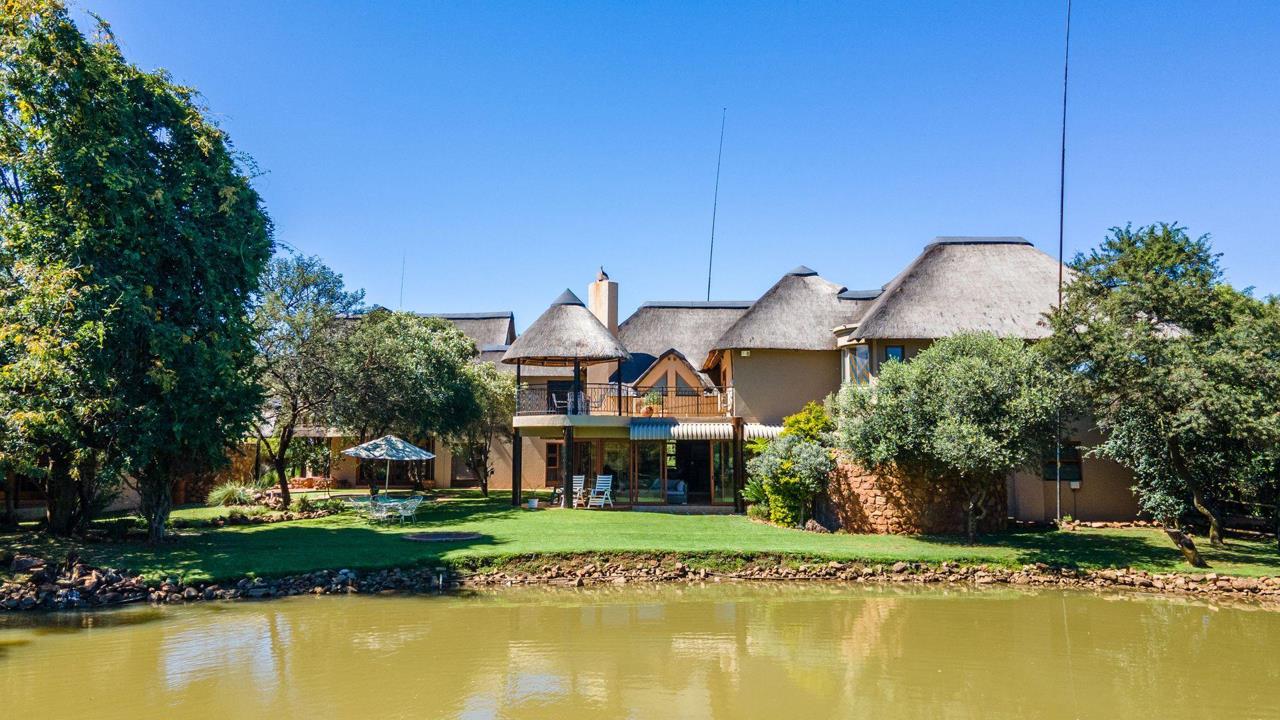 Listing number: P24-112570838, Image number: 1, View from the private dam towards the house