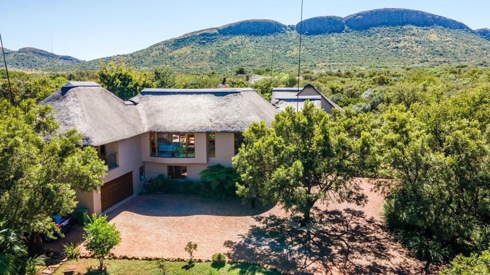 Listing number: P24-112570838, Image number: 3, Air view from the house with the mountains at the back