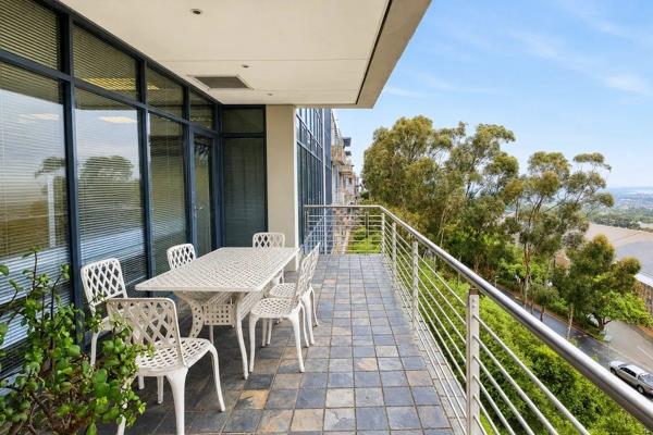 This 450m² office unit features a well-structured layout, comprising three private ...