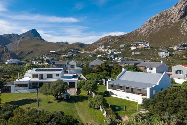 This delightful fisherman's cottage-style home enjoys an enviable location near the ...