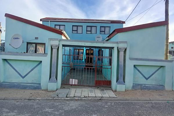 This well-maintained double-storey home offers comfortable family living together with excellent rental income potential.

The ground ...