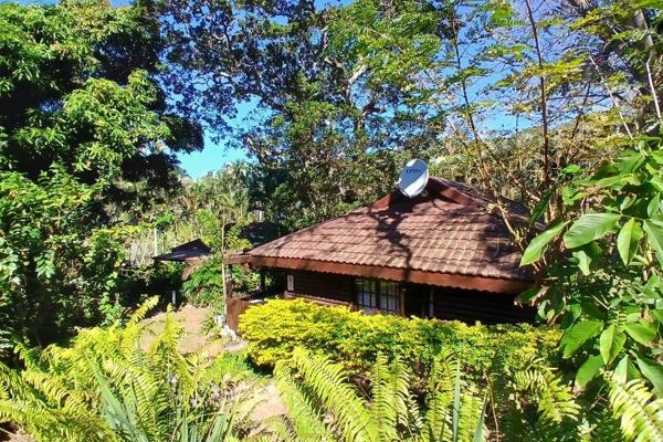 This lovely home is one of seven log cabins, the lodge offers beautiful peaceful ...