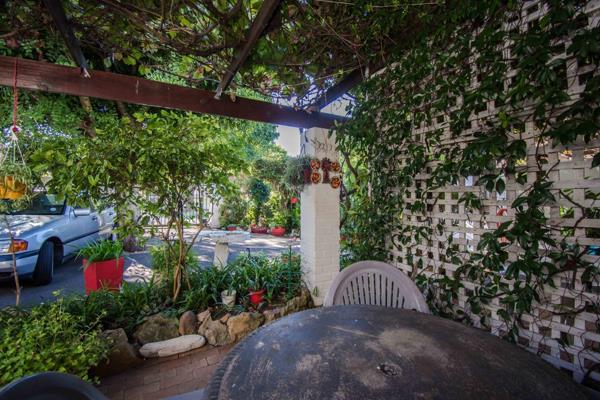 This unfurnished studio apartment offers clean, low-maintenance living with continuous tiling and built-in cupboards throughout. ...