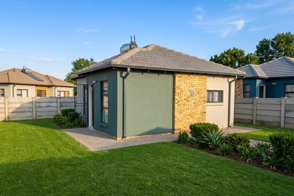 Discover a welcoming family home in Toekomsrus, Randfontein. This neat, modern house ...