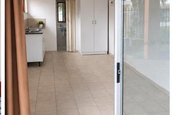 Lovely unfurnished studio flat. Long-term. Secure parking bay. Communal garden. ...