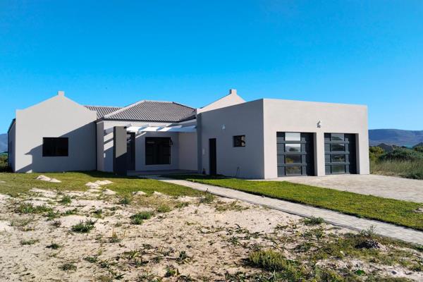 On offer is this modern family home at the mouth of the Bot River.This modern home is ...