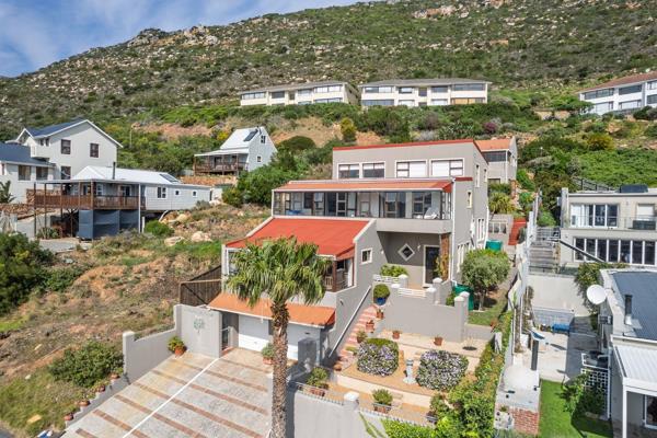 Perched on the mountainside with sweeping views over spectacular False Bay.

This ...