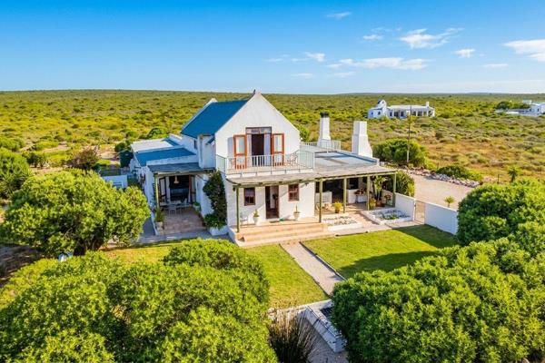 Experience the ultimate West Coast sanctuary with this spacious, character-filled ...