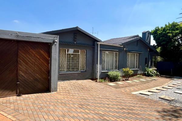 Packed with space and character, this home in a secure, boomed enclave is full of ...