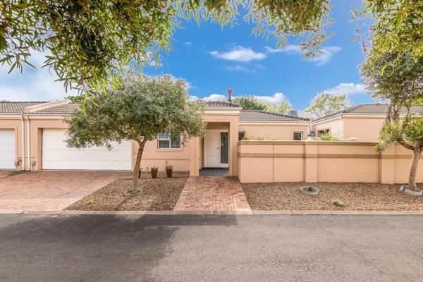 This charming home offers the perfect balance of modern comfort and convenience in a secure, centrally located complex. Designed with ...