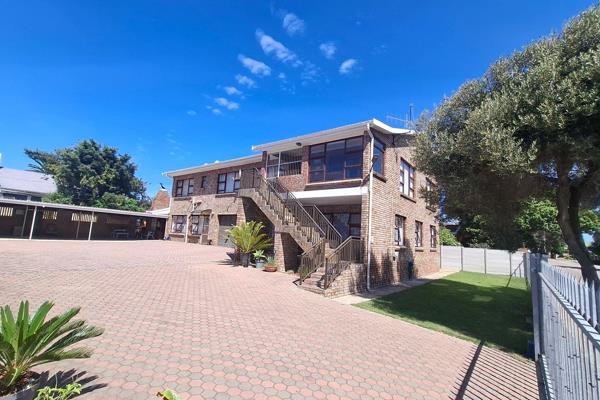 In Collaboration with the Mandate Holder
Situated in the sought-after suburb of Bayview, Hartenbos, this beautiful and versatile family ...