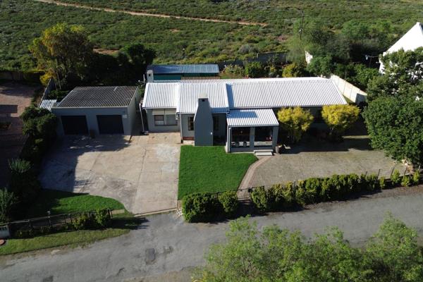 Nestled in a quiet corner of Bonnievale, this spacious and inviting family home offers ...