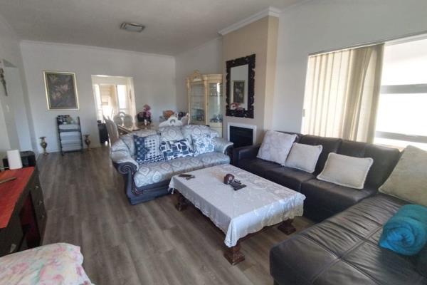 Through the entrance hall, you enter a wide and expansive open plan lounge and dining area with a separate guest bathroom. The living ...