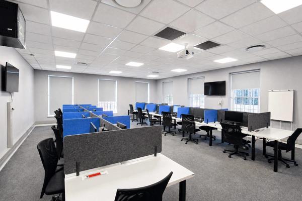 This first-floor 10 person serviced and furnished office unit spans 100 square metres ...