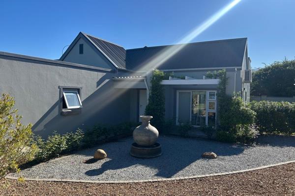 3 Bedroom house, 2 bathrooms, open plan kitchen, scullery and lounge area leading onto ...