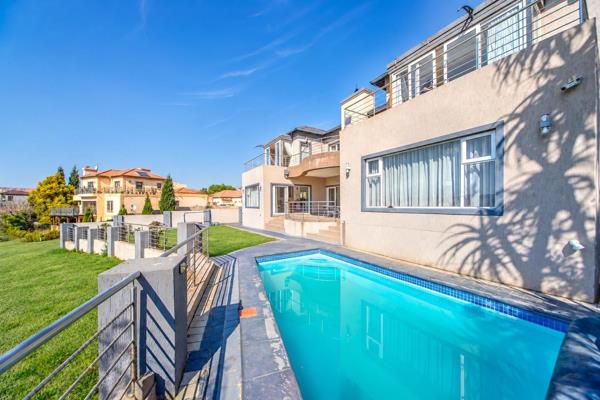 Set overlooking the golf course in Blue Valley Golf &amp; Country Estate, this well-maintained four-bedroom home offers generous living ...