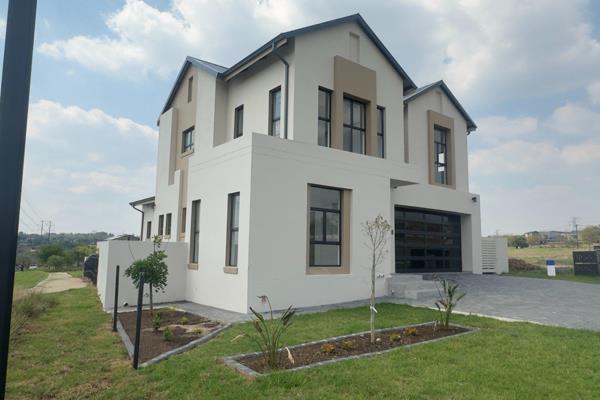 Positioned within the prestigious Helderfontein Estate, this architecturally designed ...