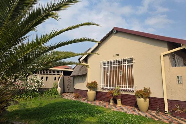 This generously proportioned family home offers a practical combination of spacious interiors, entertainment areas, security features ...