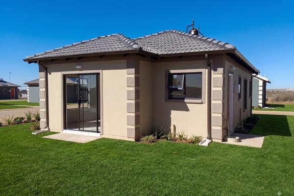 Step into a welcoming home in Buhle Park, Germiston where light floods the open plan ...