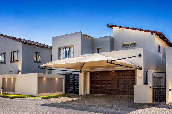 Discover refined living in this sophisticated double-storey, architect-designed home ...