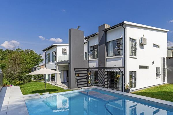 Set within the prestigious Hamilton 24-hour security enclosure, this exceptional residence combines sophisticated architecture with ...