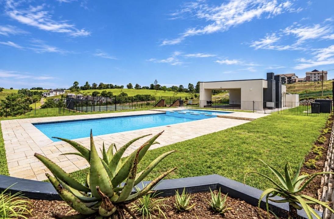 Listing number: P24-117673998, Image number: 1, Pool area in the Estate